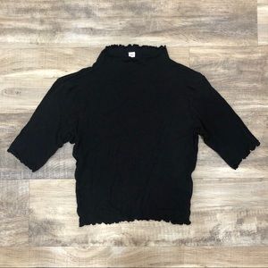 black mock neck lettuce trim shirt